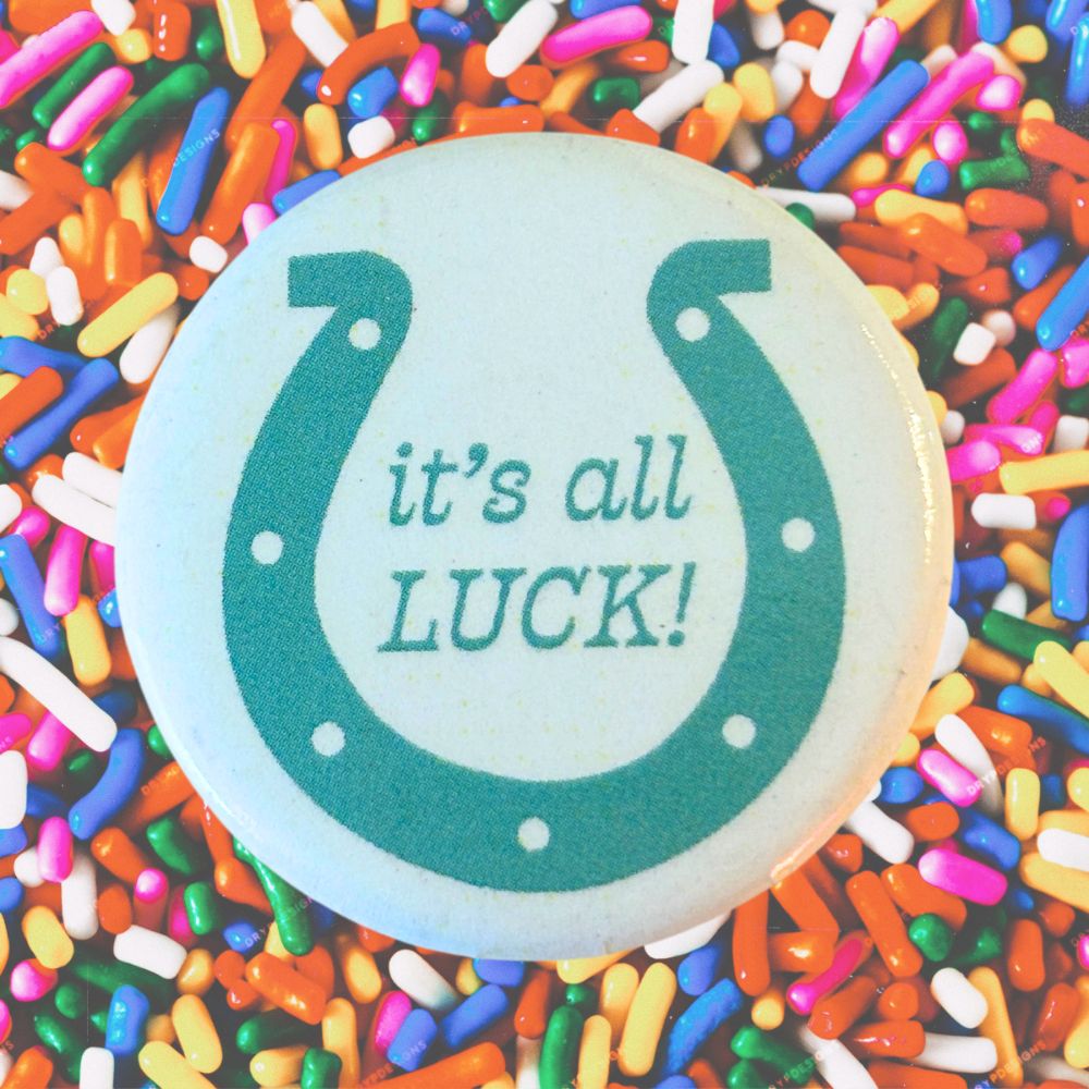 IT'S ALL LUCK BUTTON